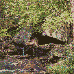 Rocks A creek running through a forest, through various large rocks